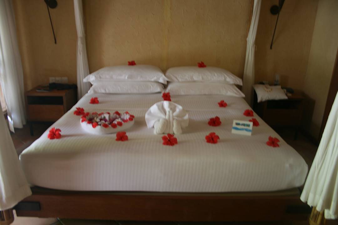 Bett in der Beach Villa Deluxe  Kuramathi Maldives