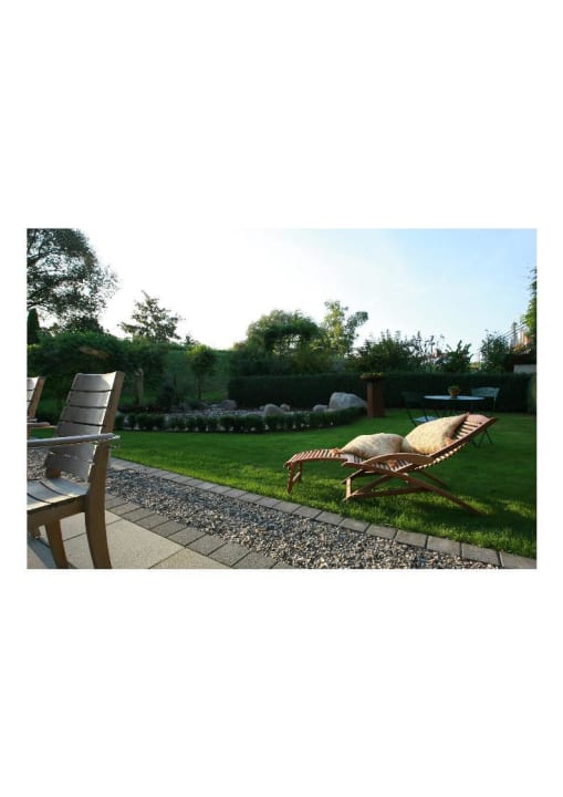 Abendsonne im AmperVilla Garten Hotel Ampervilla