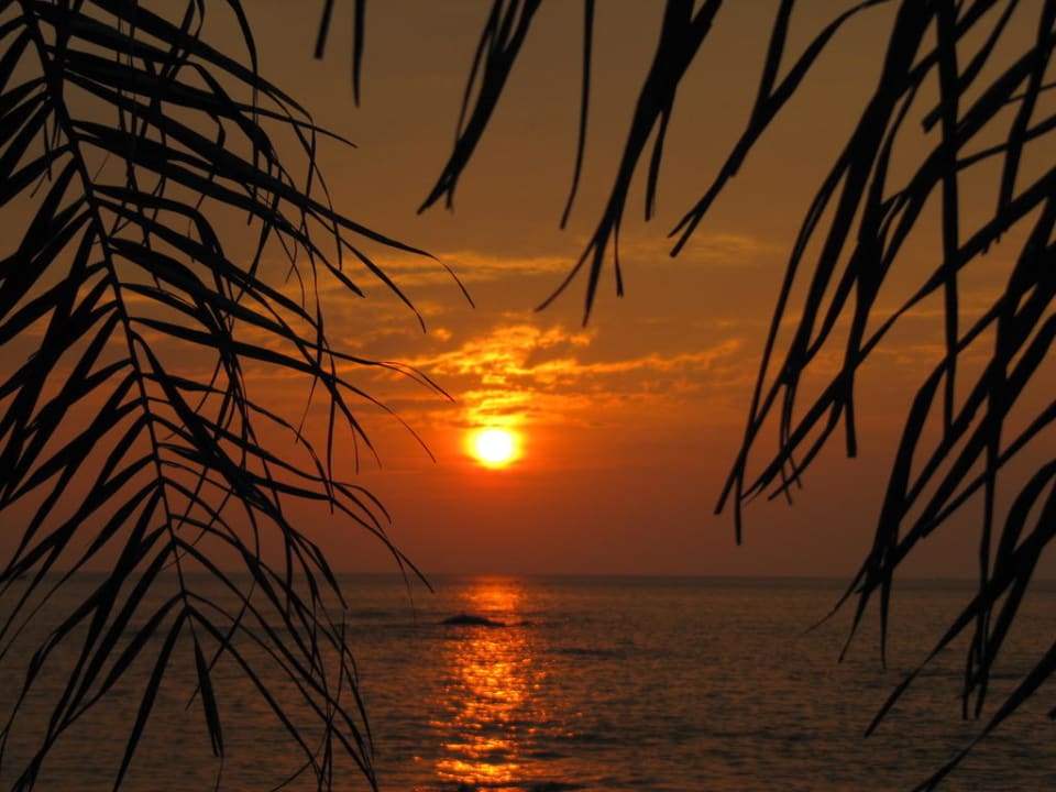 Sonnenuntergang am Hotel Ocean Breeze Resort