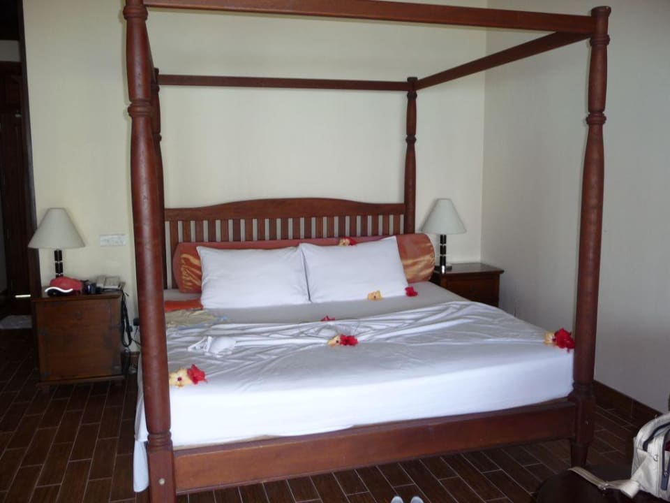 Łóżko w pokoju  typu deluxe Sun Siyam Olhuveli