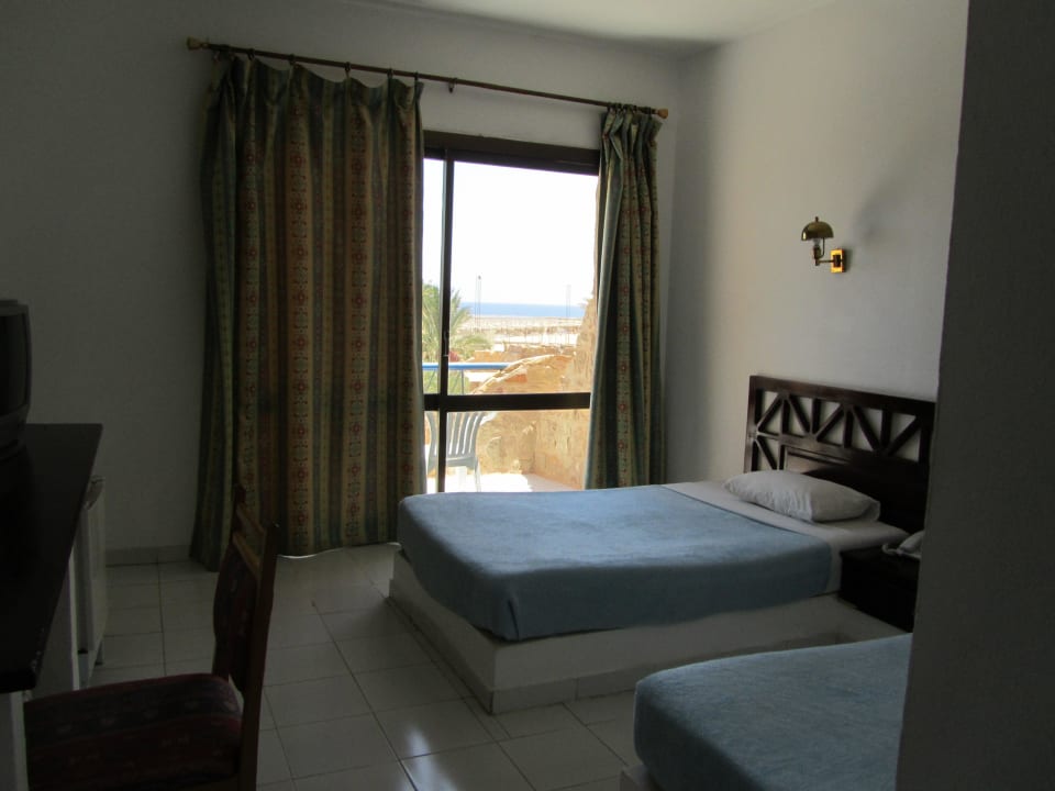 Vom Eingang ins Zimmer Utopia Beach Club