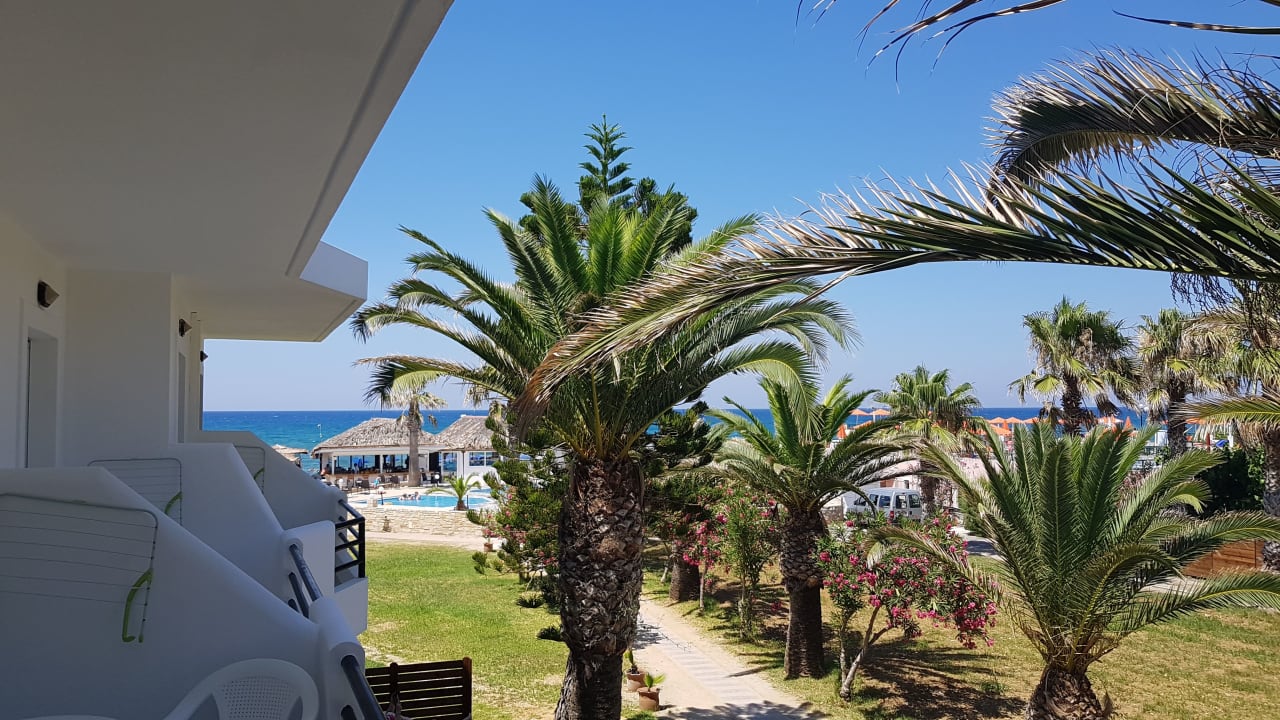 Gartenanlage HARPIN Happy Days Beach Hotel