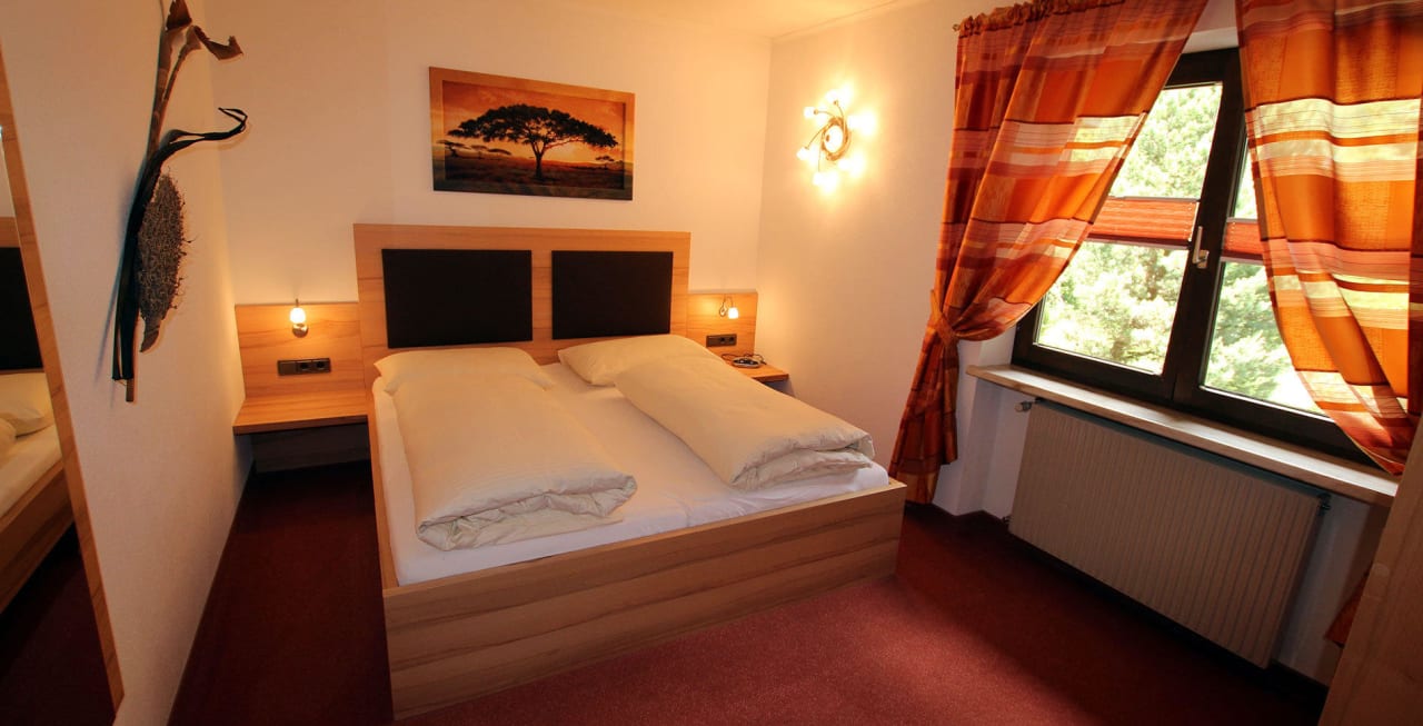 Schlafzimmer Appartement Sonnenspitze Apartments Haus am Römerweg