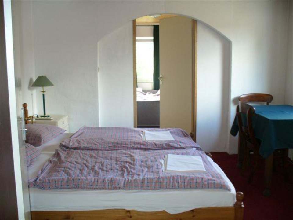 Durchgangszimmer mit Blick zum Hinterzimmer OG Apartments Stegelshof