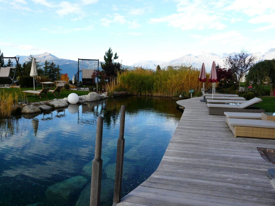 Ein Badesee glasklar Hotel Chalet Mirabell