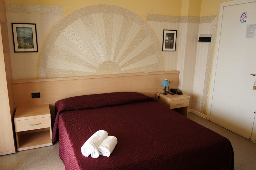 Comfortable bed Hotel Saturnia