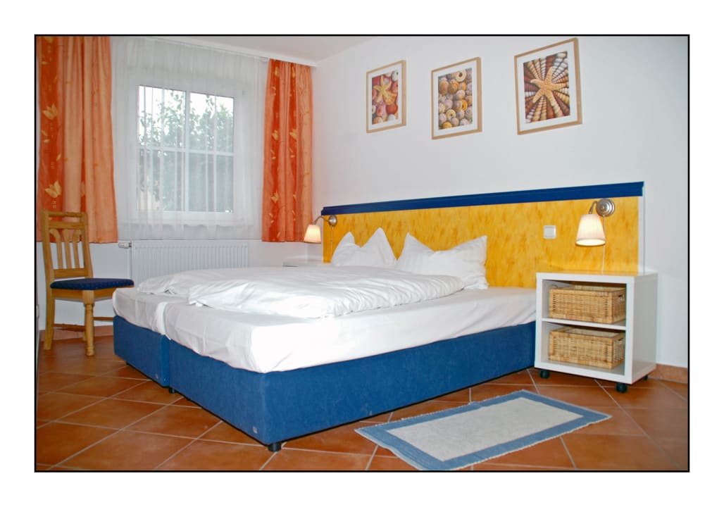 Schlafzimmer Ferienwohnungen Reethaus Seewind
