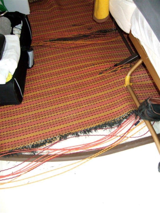 Zerrissener Teppich FKK Anlage Port Nature/Port Venus