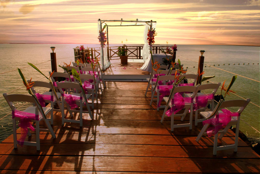 Wedding arch for boardwalk wedding Calabash Cove Resort & Spa
