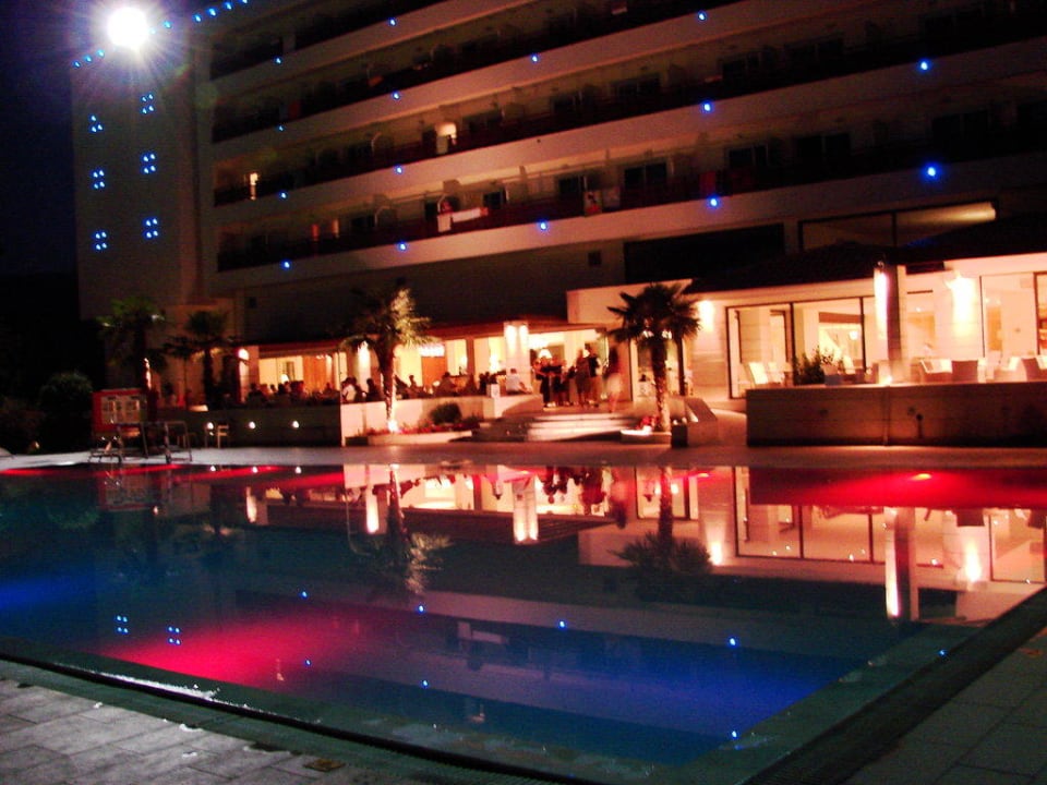 Pool by night Olympian Bay Grand Resort
