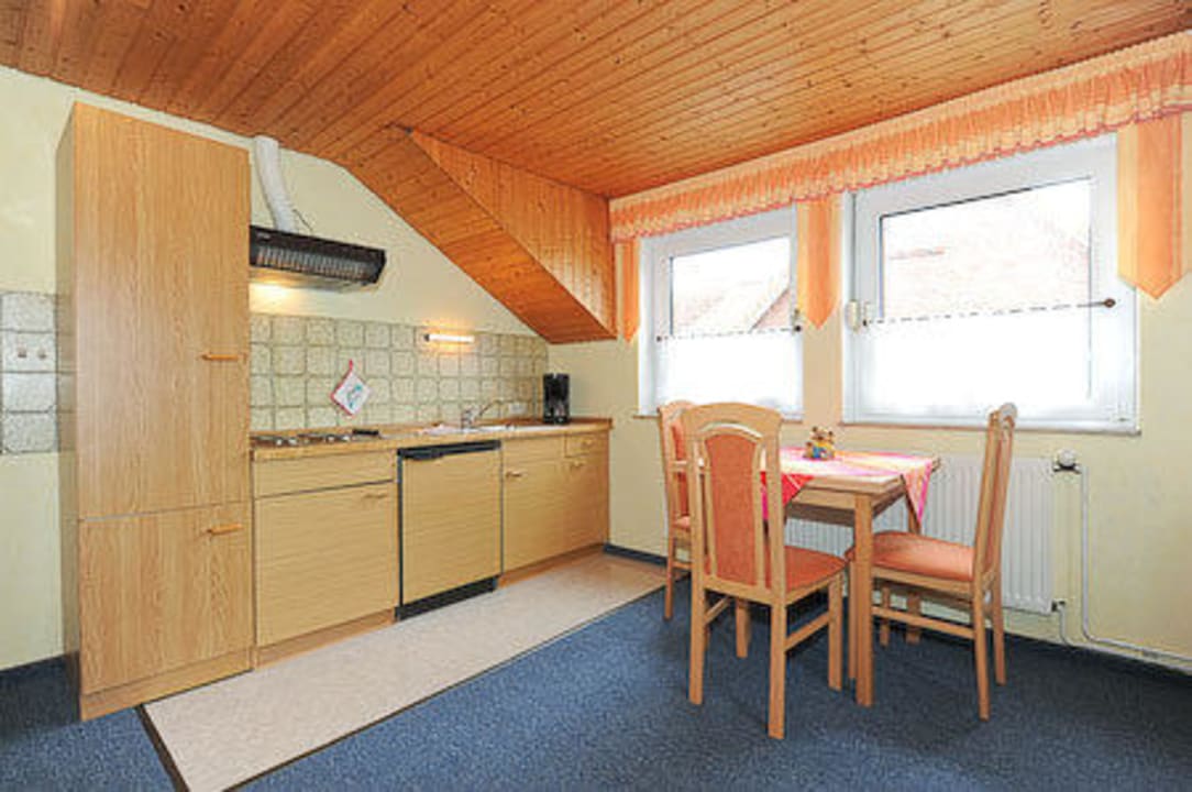 Wohnzimmer mit Küche Ferienwohnungen Haus Frohsinn