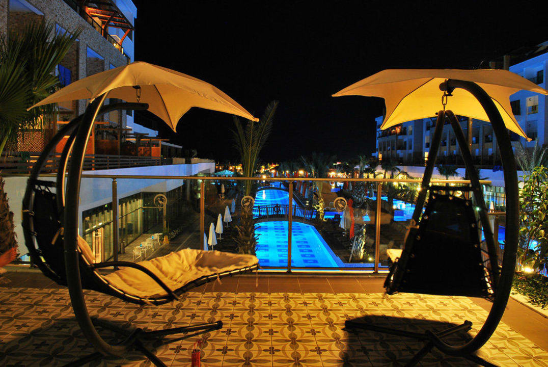 Lobby terrace at night Port Nature Luxury Resort & Spa