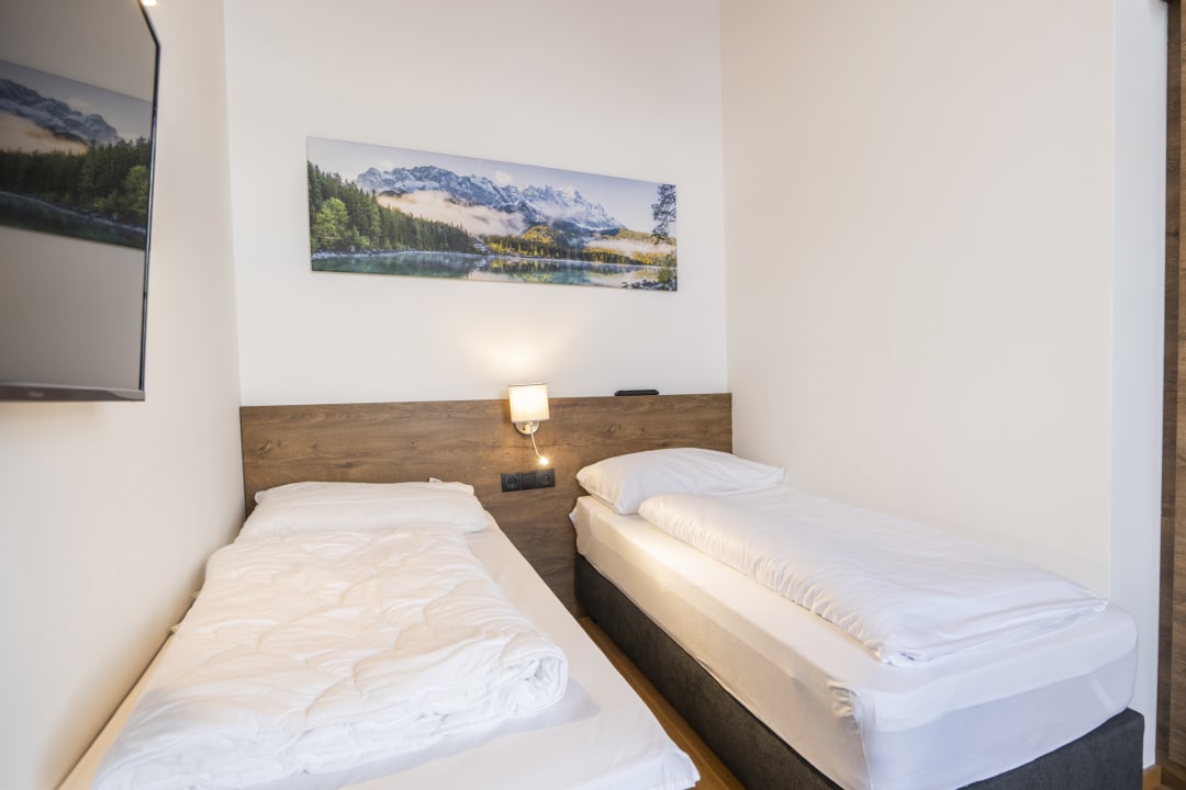Zimmer AlpenParks Hotel & Apartment Alpendorf