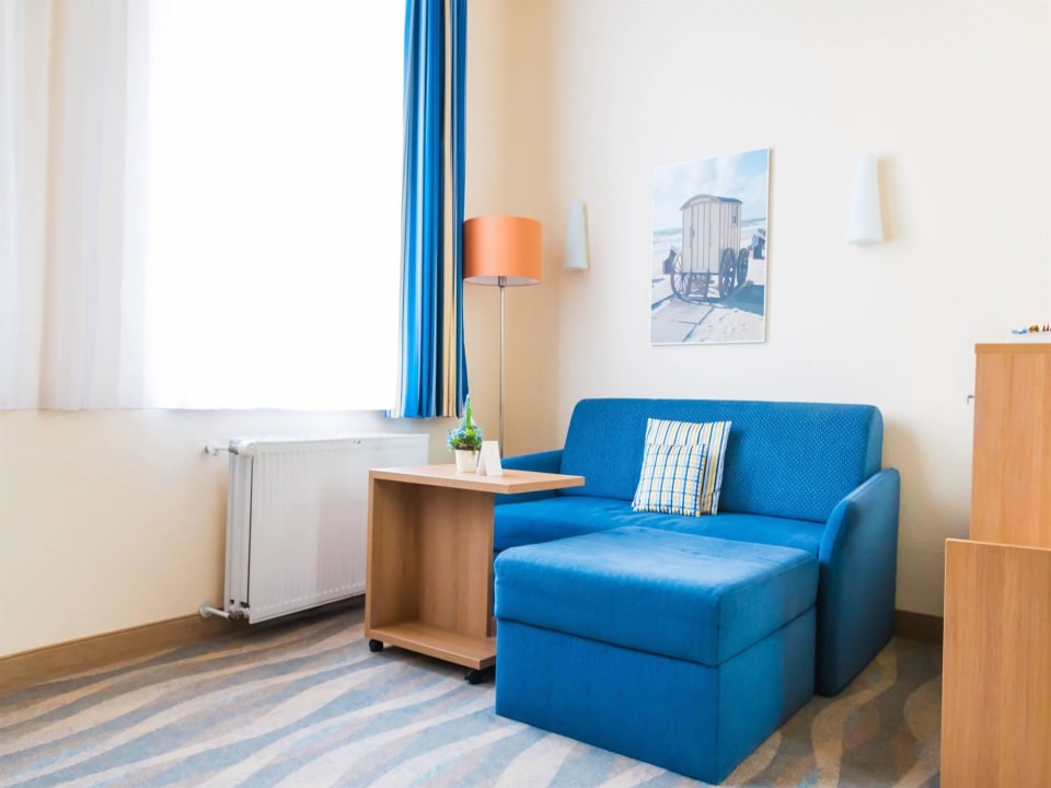 Wohnbereich, Maisonette Inselhotel Bruns