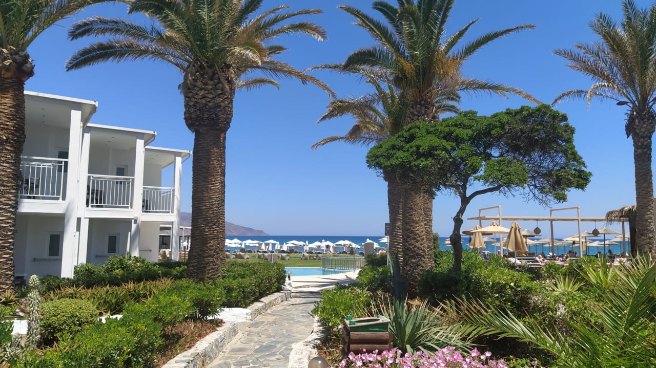 Gartenanlage HARPIN Happy Days Beach Hotel