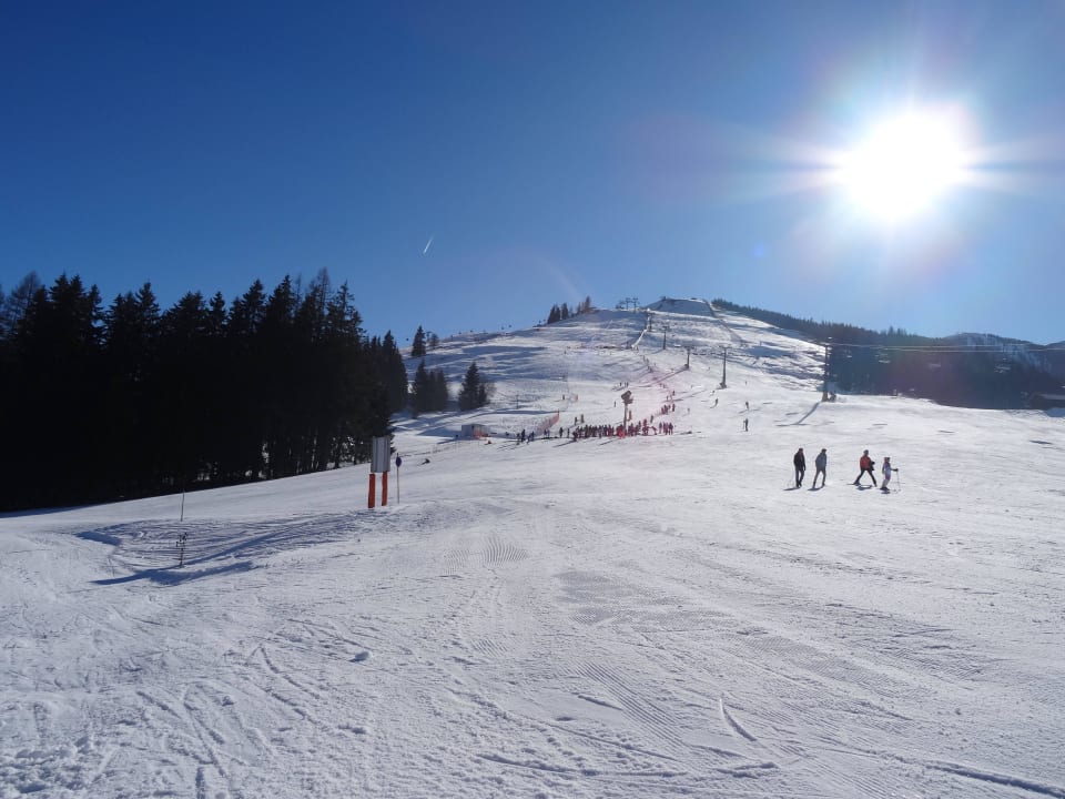 Piste von der Terrasse aus Holzhotel Forsthofalm