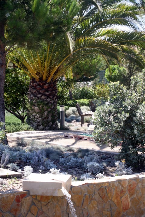 Teich im Garten Ozadi Altura Beach Resort