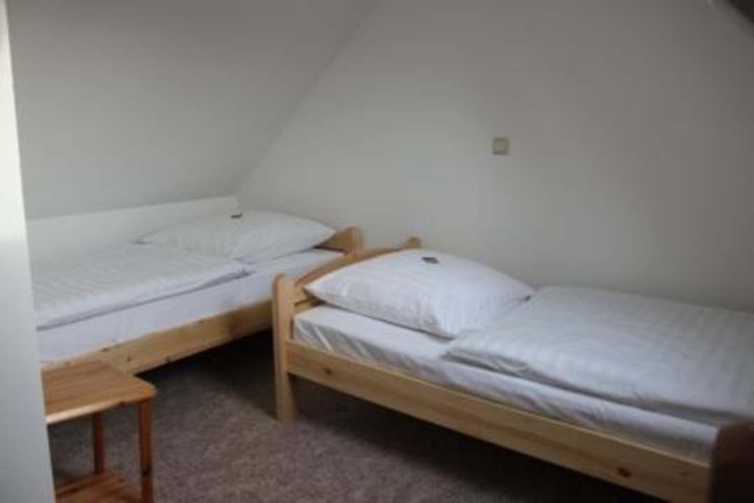 1. Schlafzimmer rechts oben Ferienwohnungen Altstadtnest