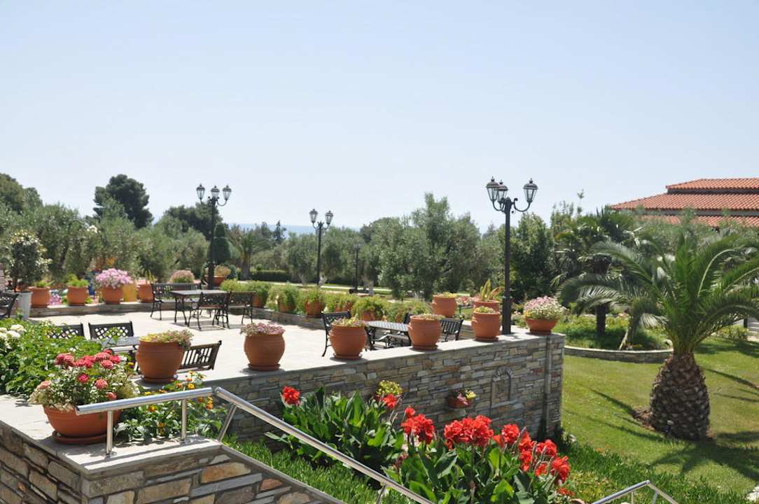 Gartenbereich mit Akzenten Blue Dolphin Resort Hotel