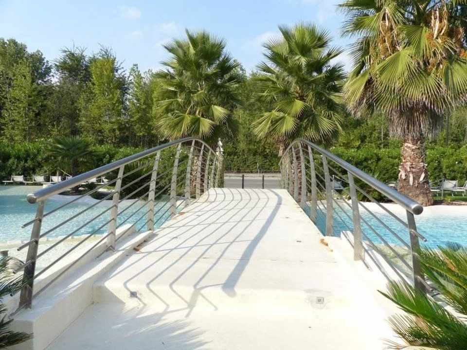 Poolübergang Hotel Residence Relais Du Lac