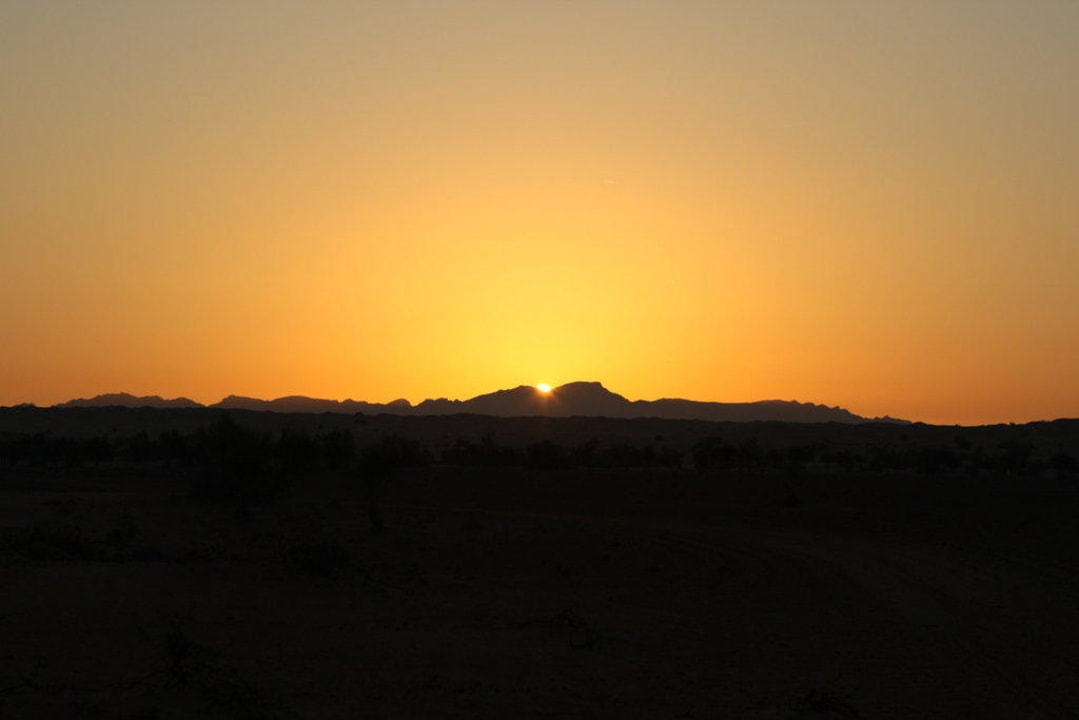 Sonnenaufgang über dem Hatta Al Maha, A Luxury Collection Desert Resort & Spa