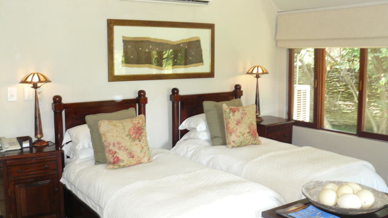 Schlafbereich der Deluxe Suite Savanna Private Game Reserve