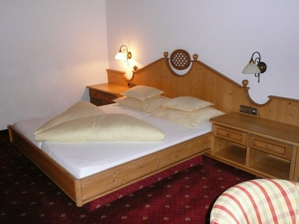 Schlafzimmer in der Juniorsuite Auenhotel