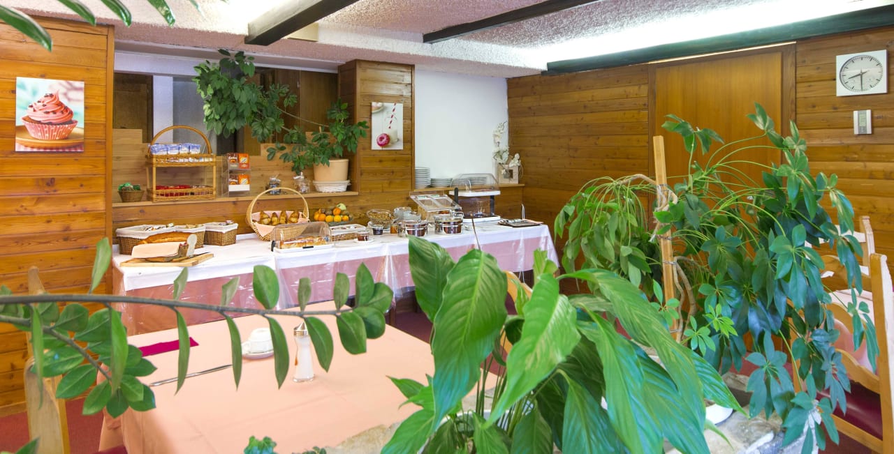 Salle du petit-déjeuner Hotel La Prairie
