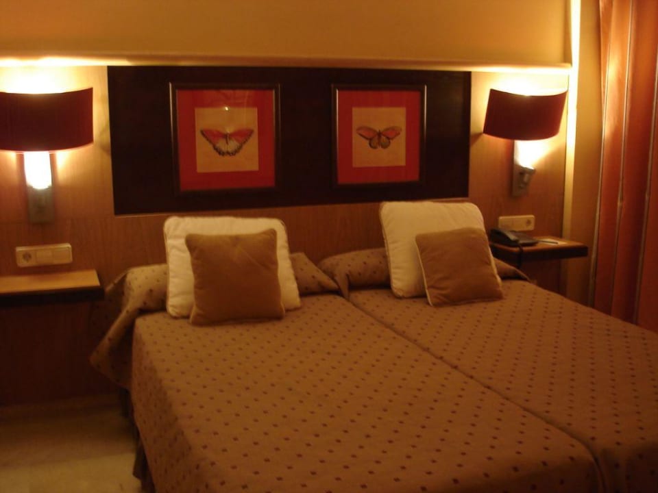 Das Schlafzimmer Grupotel Playa de Palma Suites & Spa