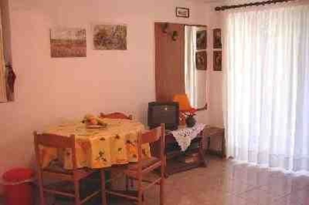 Wohnzimmer gemütlich, mit TV Ferienwohnung La Gardenia