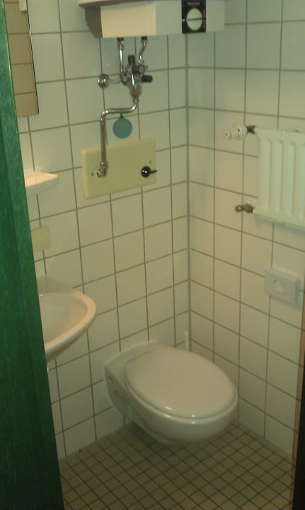Toilette. Männer-auf den Kopf aufpassen Heinrich Pesch Hotel