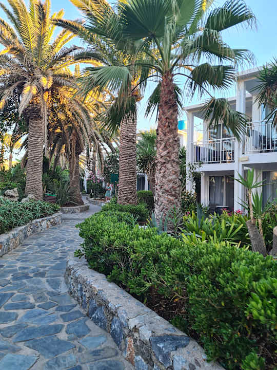 Gartenanlage HARPIN Happy Days Beach Hotel