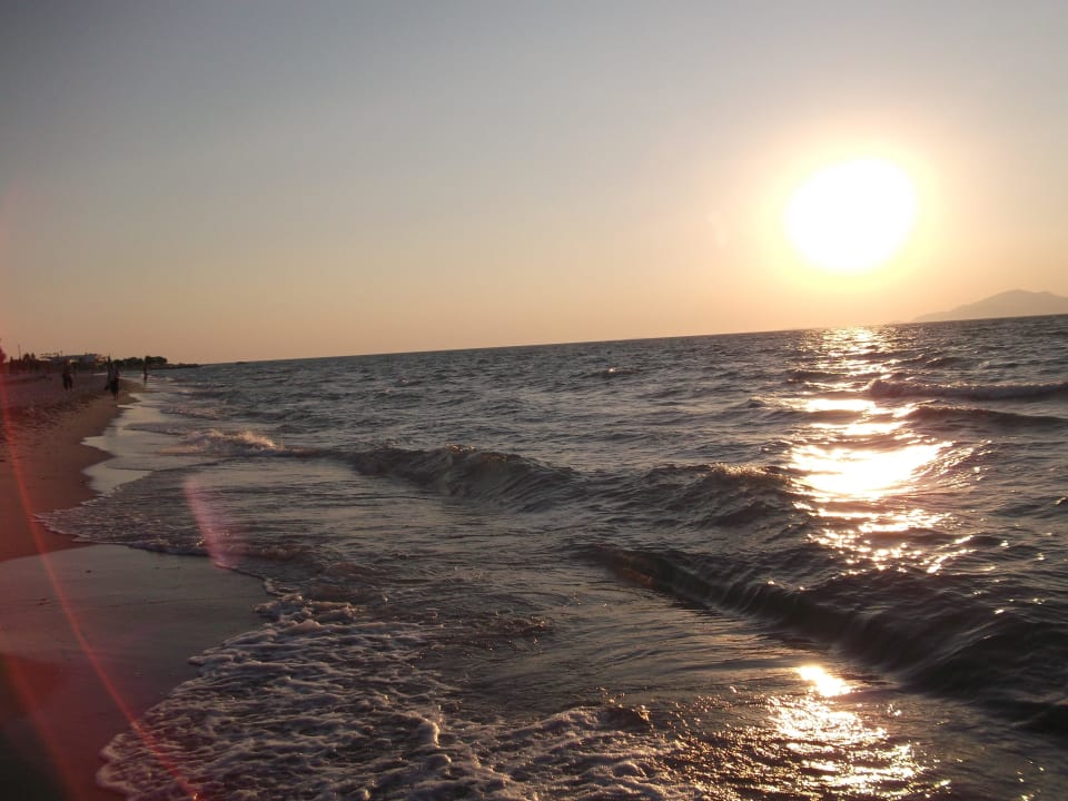 Strand bei Sonnenuntergang Caravia Beach Hotel