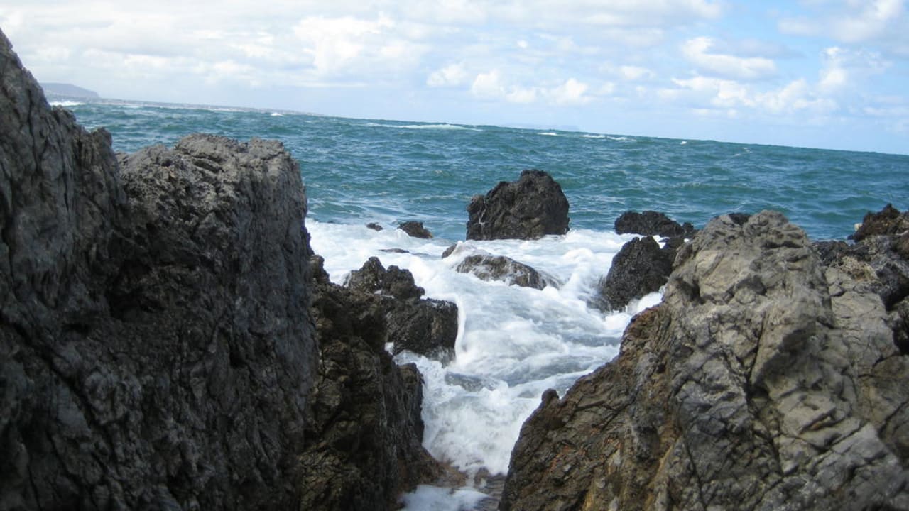 Widok ze skał przy zatoczce Grecotel Meli Palace