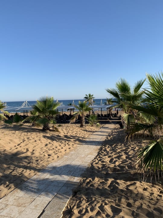 Strand Club Grand Side