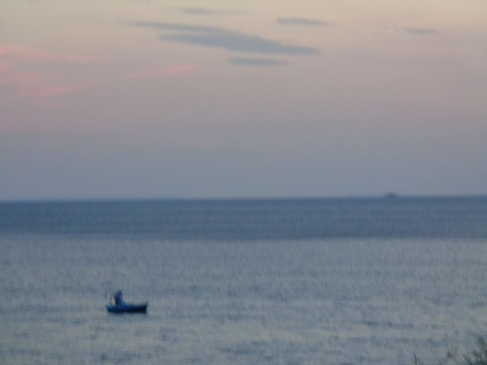 Blick Abends auf das Meer Kouros Seasight Hotel