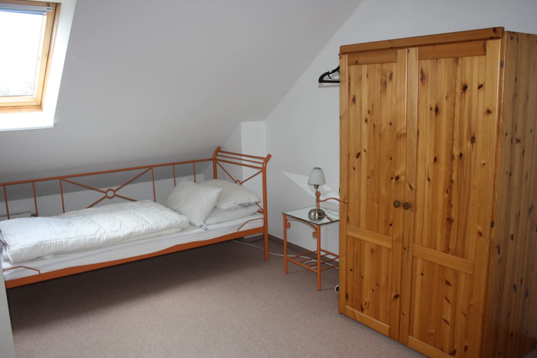 Schlafzimmer im Obergeschoss Aparthotel Am Schloßpark