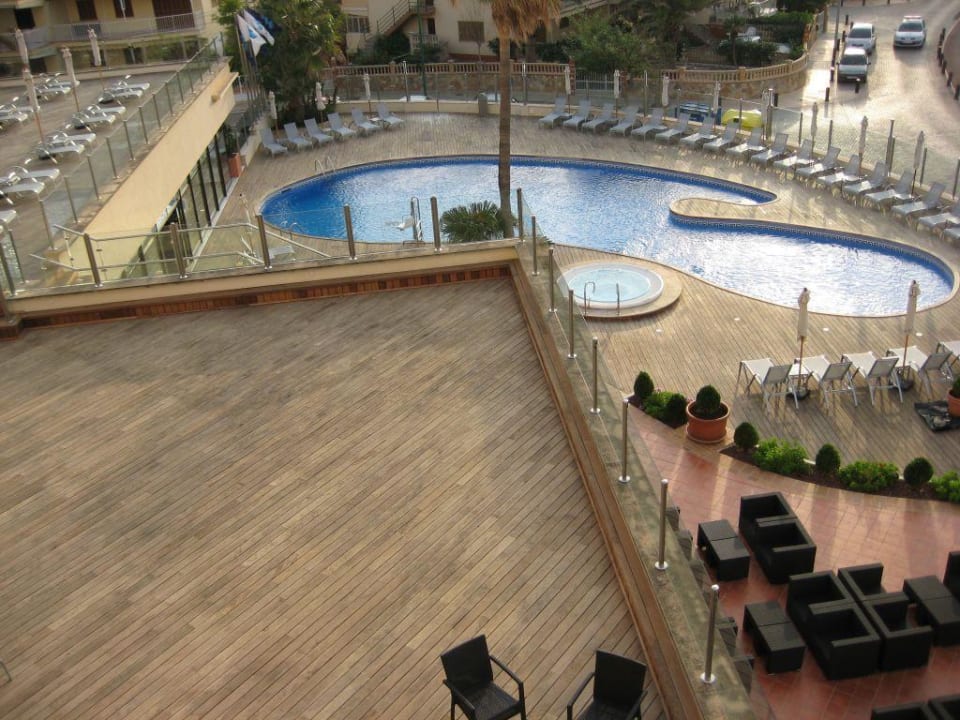 View of pool, terrace, sun deck from our balcony AluaSoul Palma