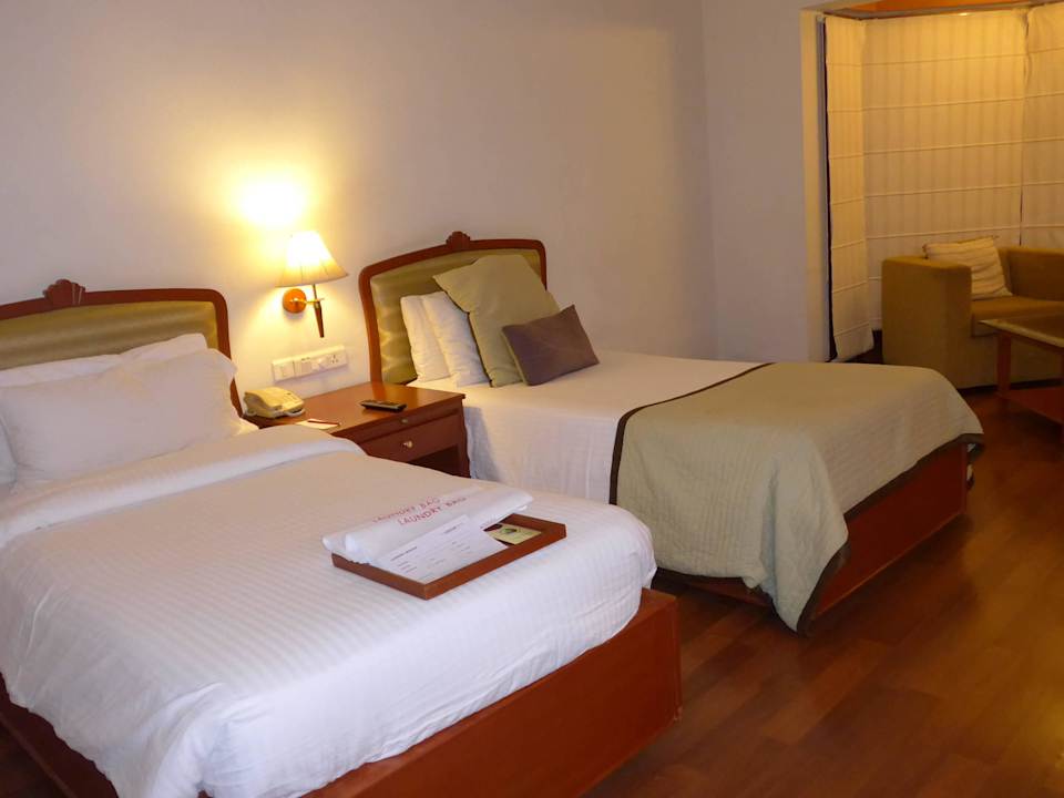 Betten im Zimmer 51 The Gateway Hotel Pasumalai