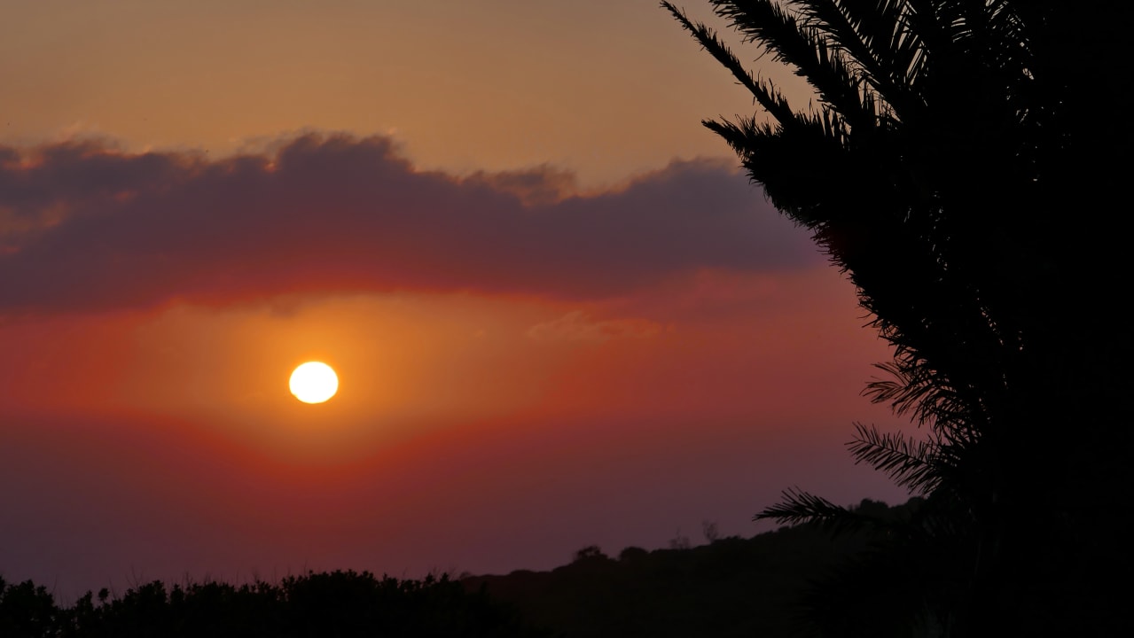 Sonnenuntergang von der Terrasse Blue Horizon Bay Guest House