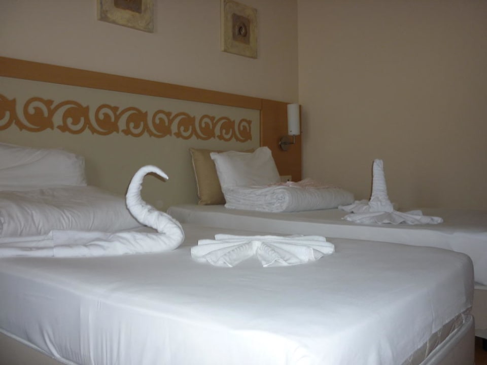 Schön gestaltete Betten Solivia Hotel