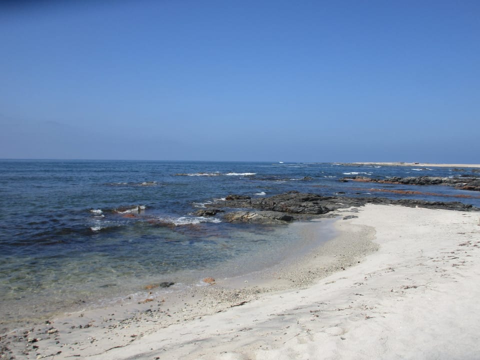 Steinstrand Wyndham Garden Salalah Mirbat