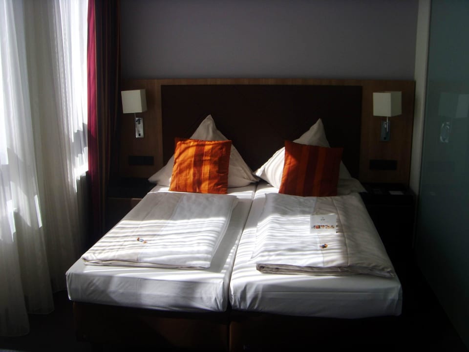 Doppelzimmer - Schlafbereich ACHAT Hotel München Süd