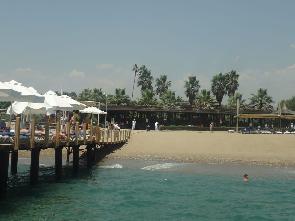 Strand vom Steg aus fotografiert Blue Waters Club