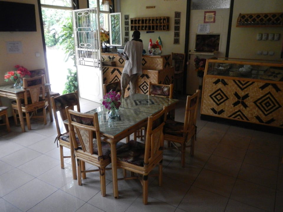 Our reception and some seats of the restaurant. African Village Hotel