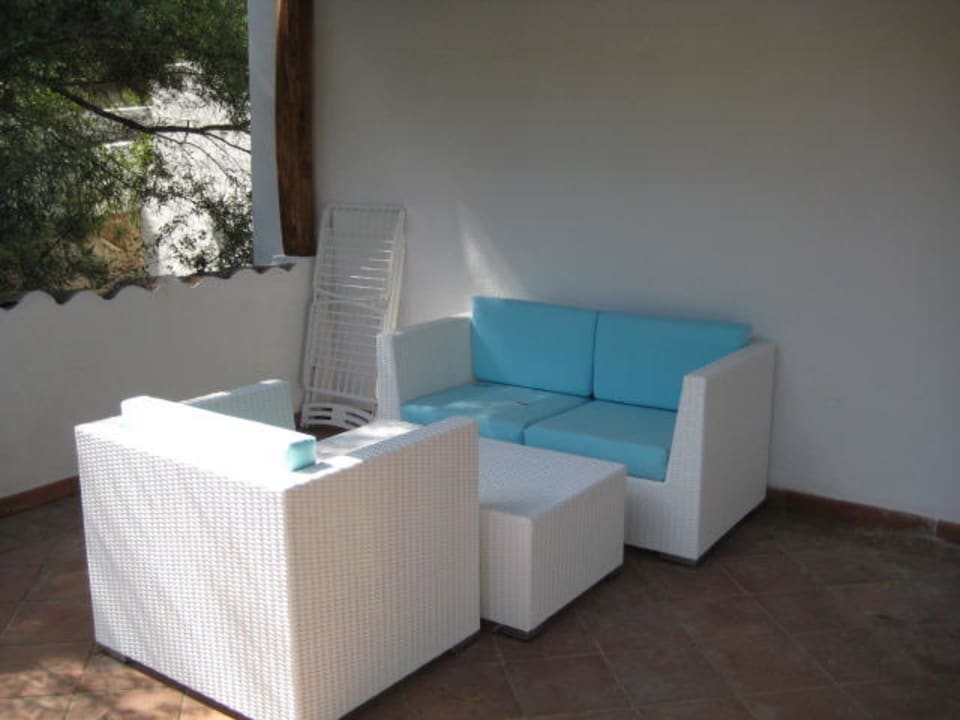 Terrasse vorm Eingang Arbatax Park Resort - Telis