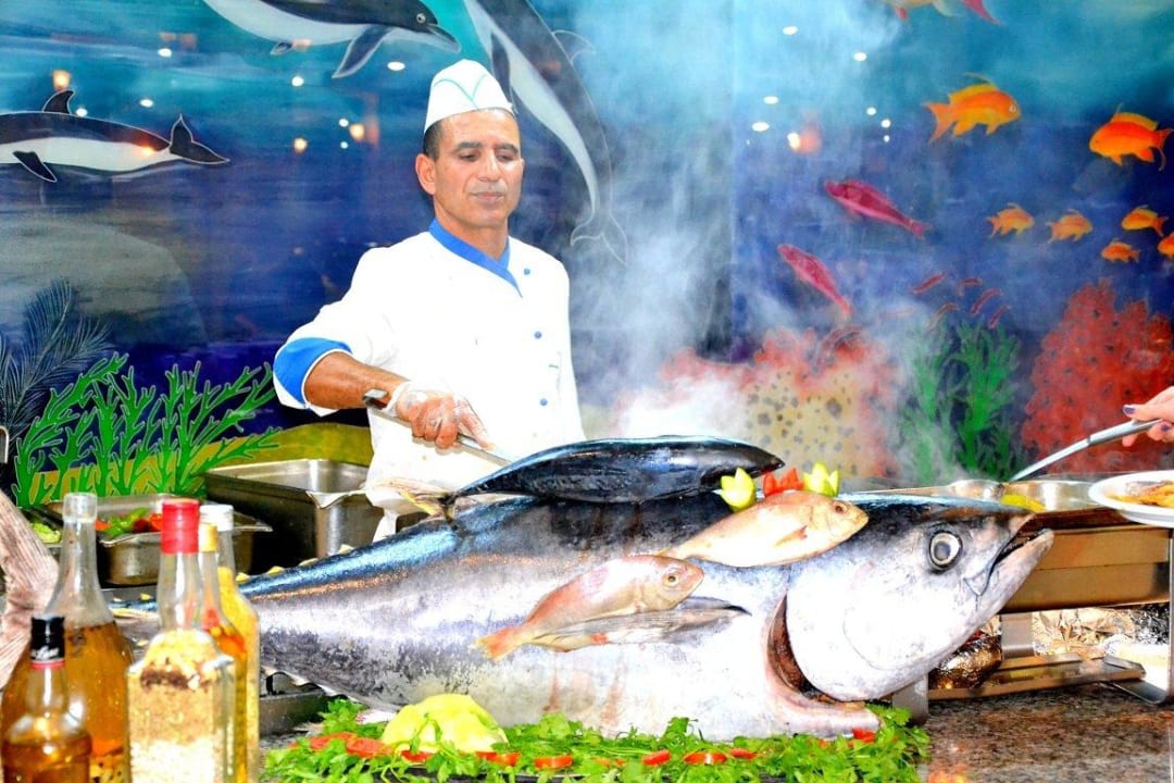 Koch bei der Arbeit Hotel Paradis Palace