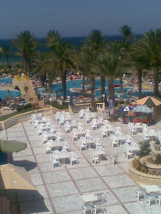Outdoor tables  Houda Golf & Beach Club
