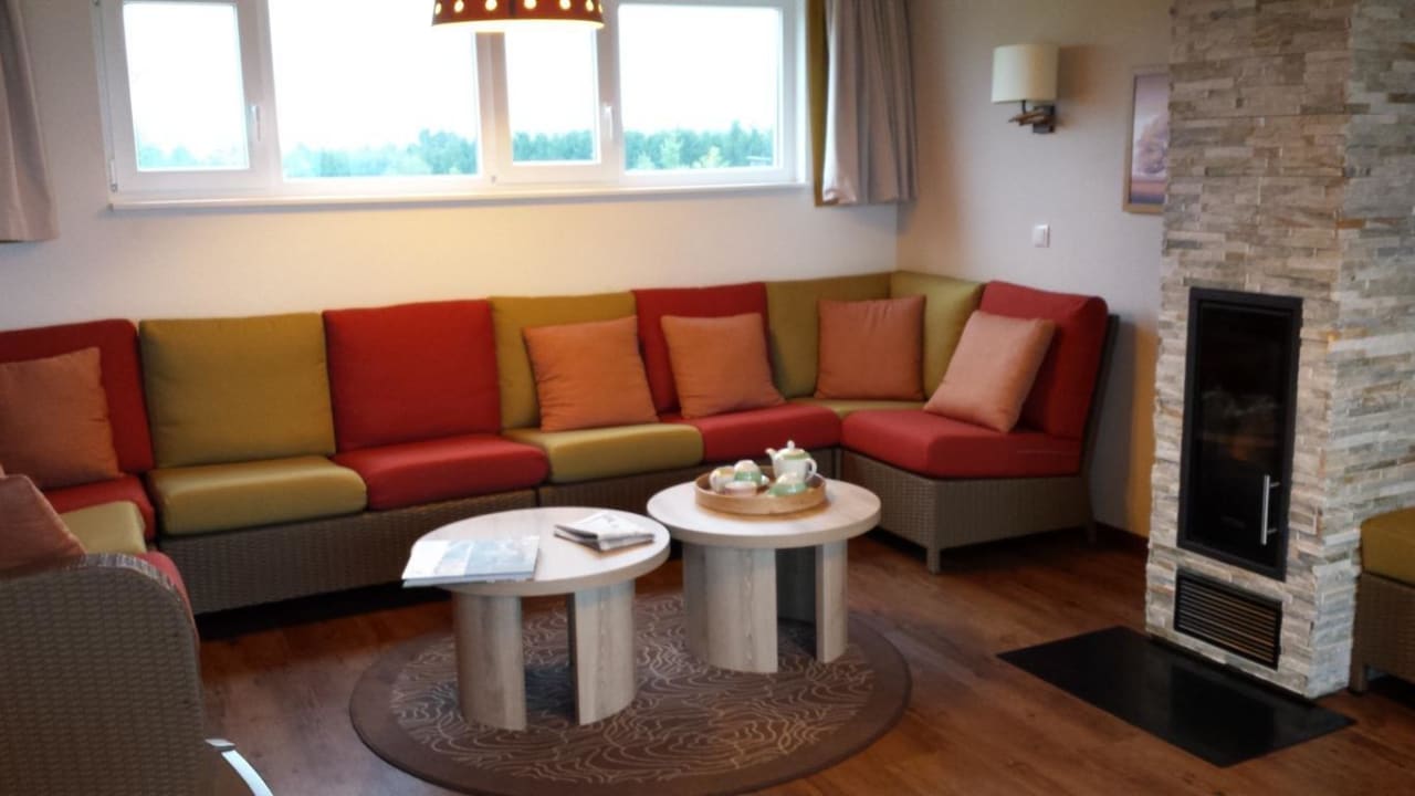 Wohnzimmer mit Kamin Center Parcs Park Bostalsee