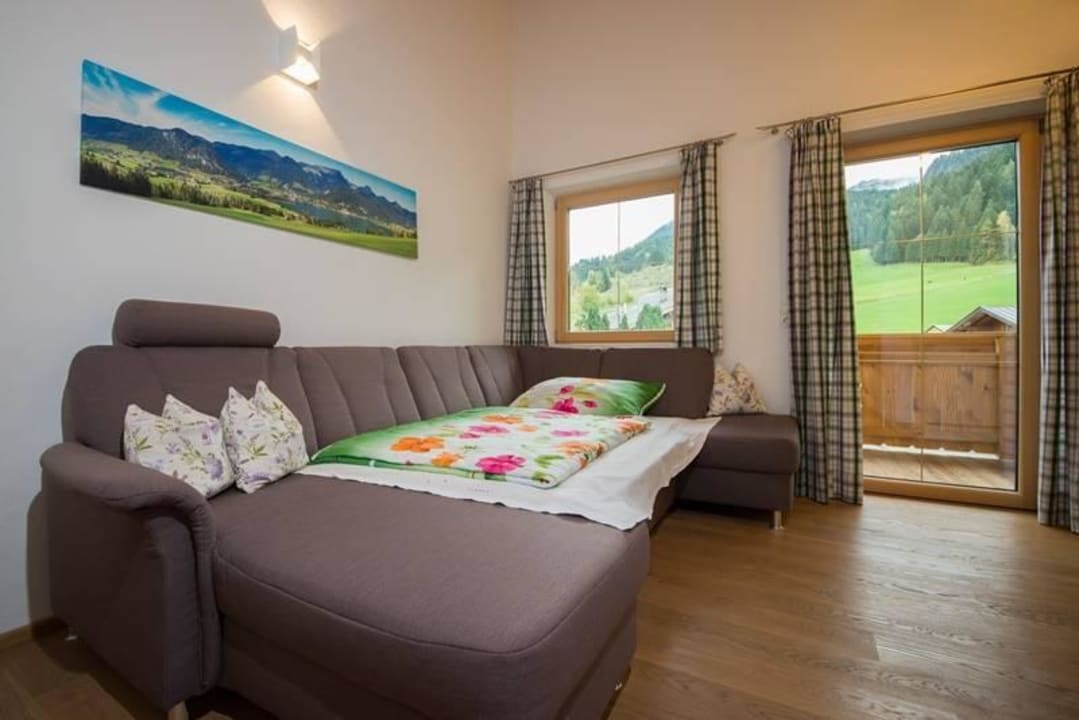 Wohnraum mit Schlafcouch (FeWo Zahmer Kaiser) Ferienwohnung am Buchberg